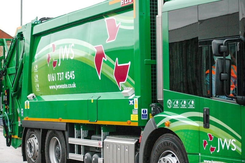 JWS Waste's new vehicles showcase the new branding with vibrant green waves, large red arrows that are iconic for our recycling passion and white bold text that stands out