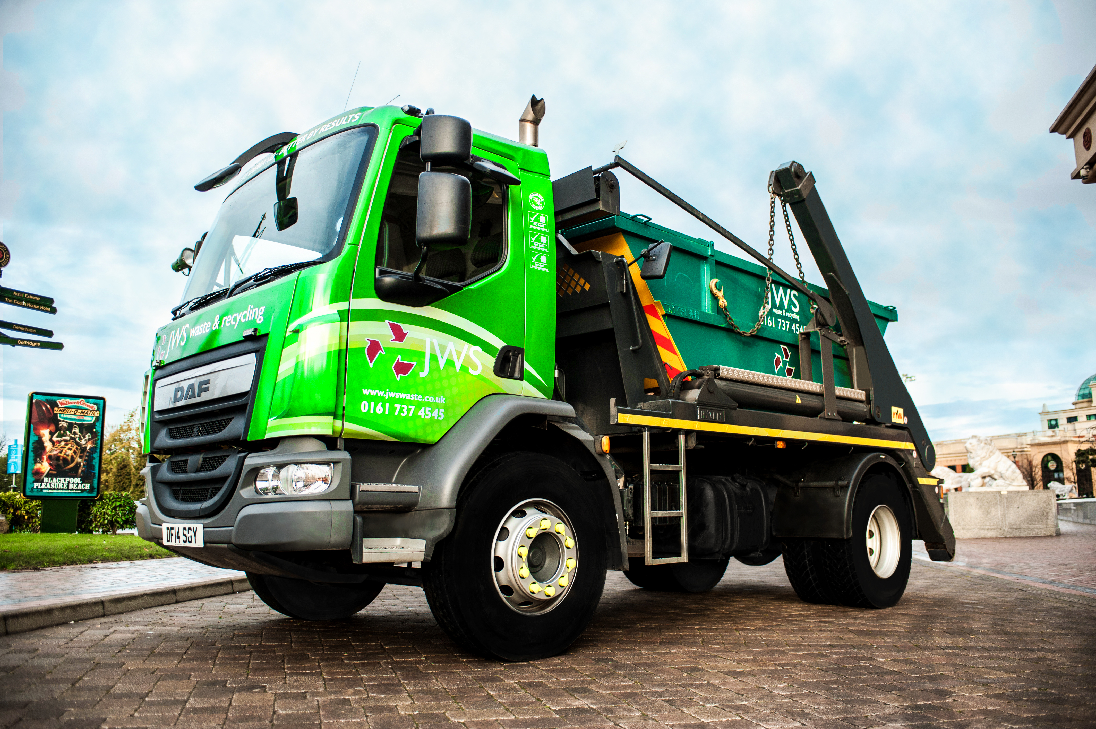 New, bright green JWS Waste vehicles are brimming with recycling passion with iconic arrowed symbol that is the JWS logo.